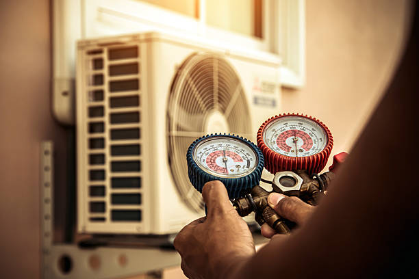 Professional Air Conditioning Service technician working in Montville, NJ